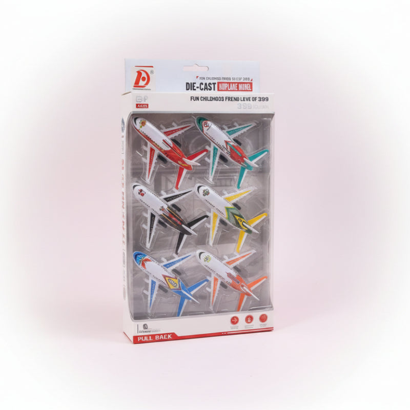 Packaged set of die-cast airplane models on a wooden surface with a plain background