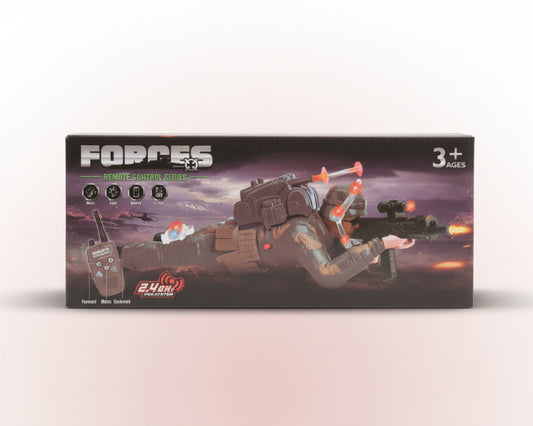 Box of a toy gun with remote control features on a wooden surface.