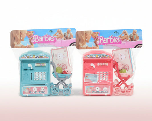 Two toy cash registers with packaging featuring Barbie branding on a wooden surface.