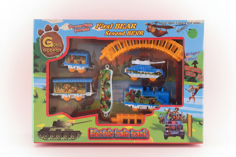 Box of a toy electric train set with various vehicles and scenery