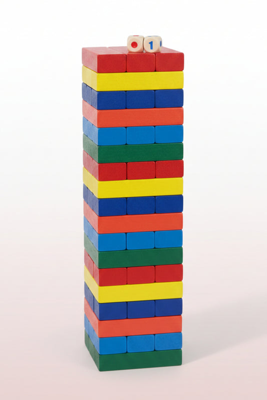 Stack of colorful building blocks on a wooden surface with a white background