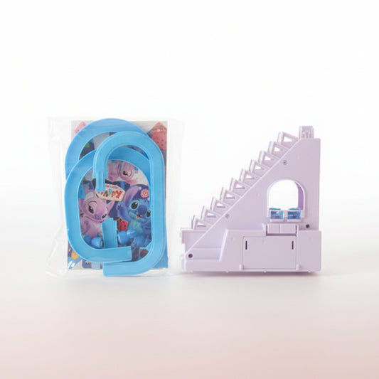 Children's toy set with a blue plastic case on a wooden surface