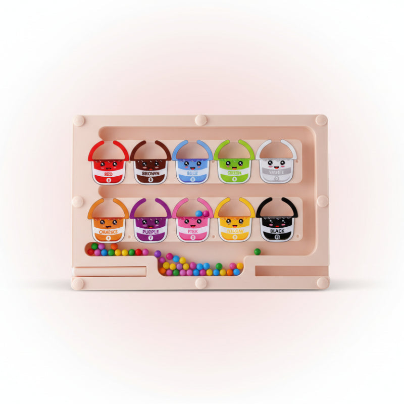 Color sorting toy with cartoon faces and color labels on a wooden surface.