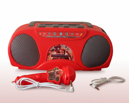 Red boombox with microphone and cables on a wooden surface