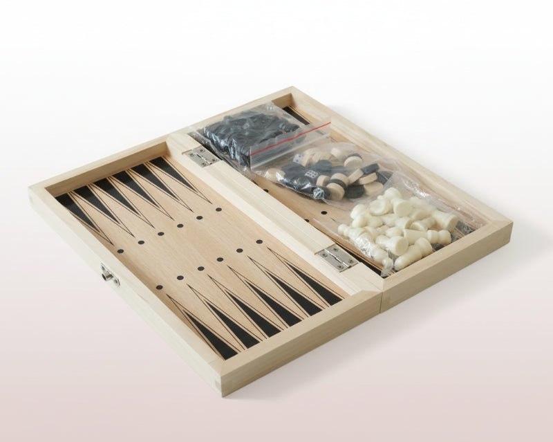 Backgammon set with pieces in a wooden box on a wooden surface