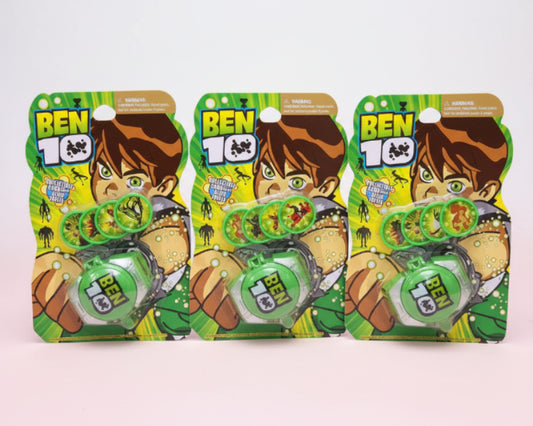 Three packages of Ben 10 toys on a wooden surface with a white background