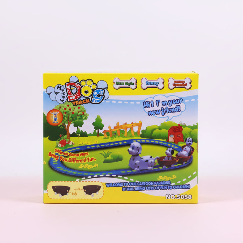 Box of a toy dog track set with colorful graphics and text on a wooden surface.