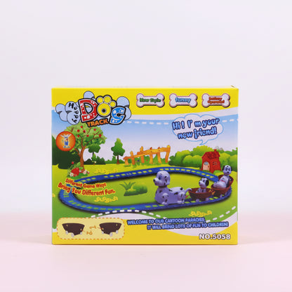 Box of a toy dog track set with colorful graphics and text on a wooden surface.