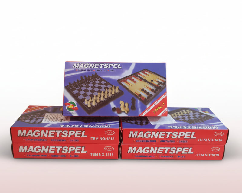 Three boxes of Magnetspel games on a wooden surface with a white background