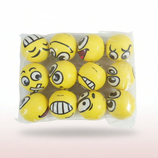 Pack of yellow emoji balls with various facial expressions on a wooden surface.