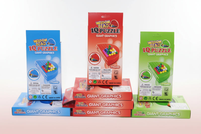 Three Wisdom Bead IQ Puzzle boxes in blue, red, and green on a wooden surface.