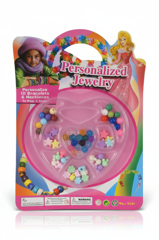 Personalized jewelry kit packaging with colorful beads and a cartoon character on a wooden surface.