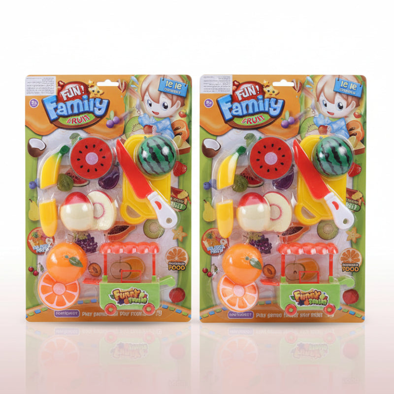Two packages of 'Fun Family' toy fruit set on a wooden surface with a white background.