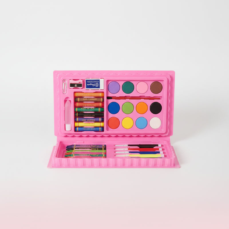 Pink art kit with crayons, markers, and paint on a wooden surface