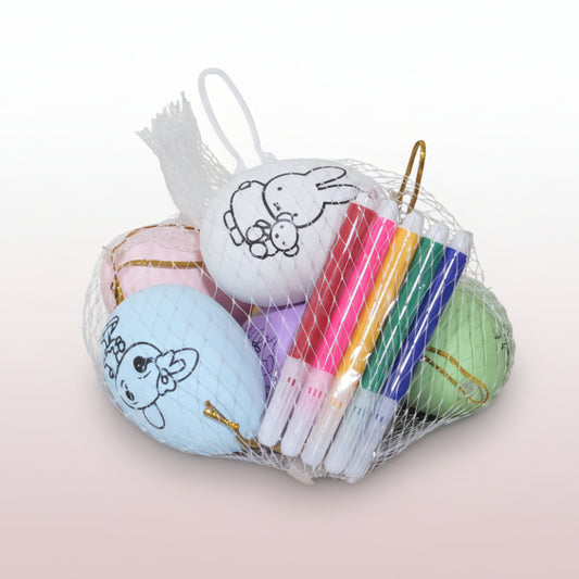 Colorful markers with cartoon characters on a wooden surface