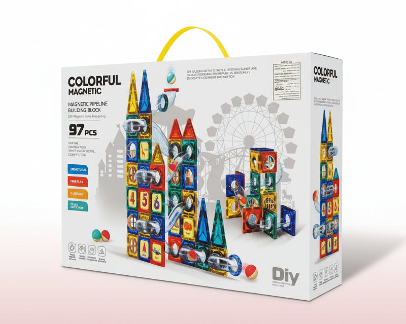Box of colorful magnetic building blocks with toy structures on a plain background