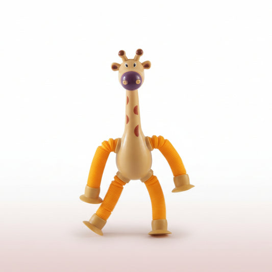 Toy giraffe with a purple nose on a white background