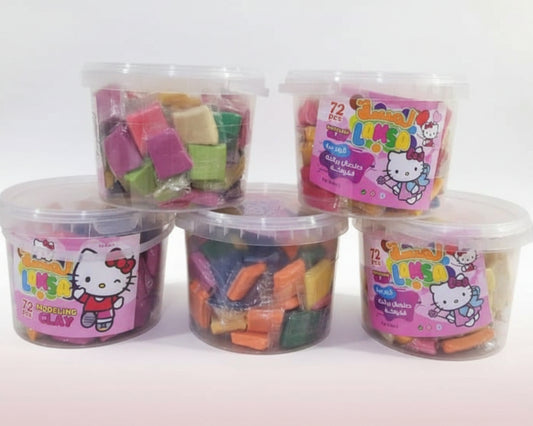Five containers of colorful clay with Hello Kitty branding on a wooden surface.