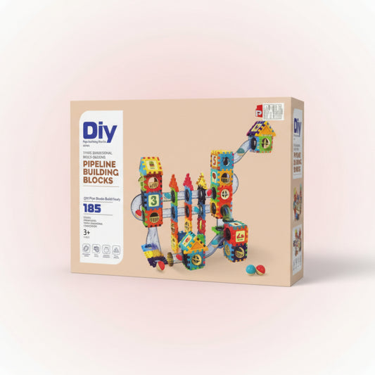 Box of DIY pipeline building blocks with colorful design on a wooden surface.