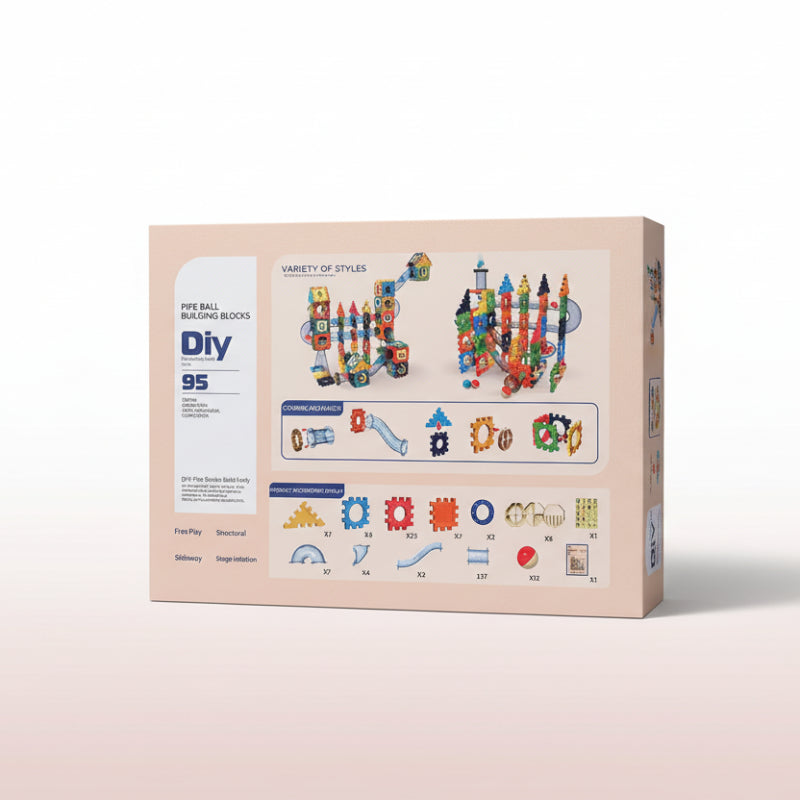 Cardboard box of Pipe Ball Building Blocks with colorful illustrations on a wooden surface.