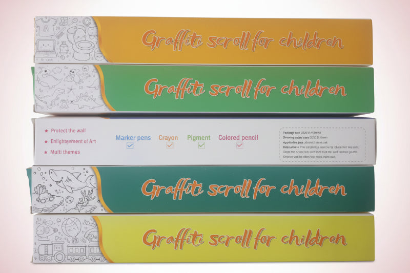 Stack of 'Graffiti scroll for children' books on a wooden surface