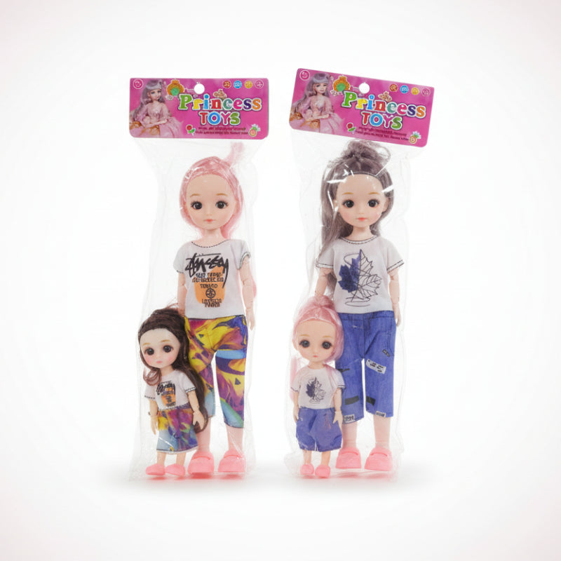 Two dolls in packaging with 'Princess Toys' branding on a wooden surface.