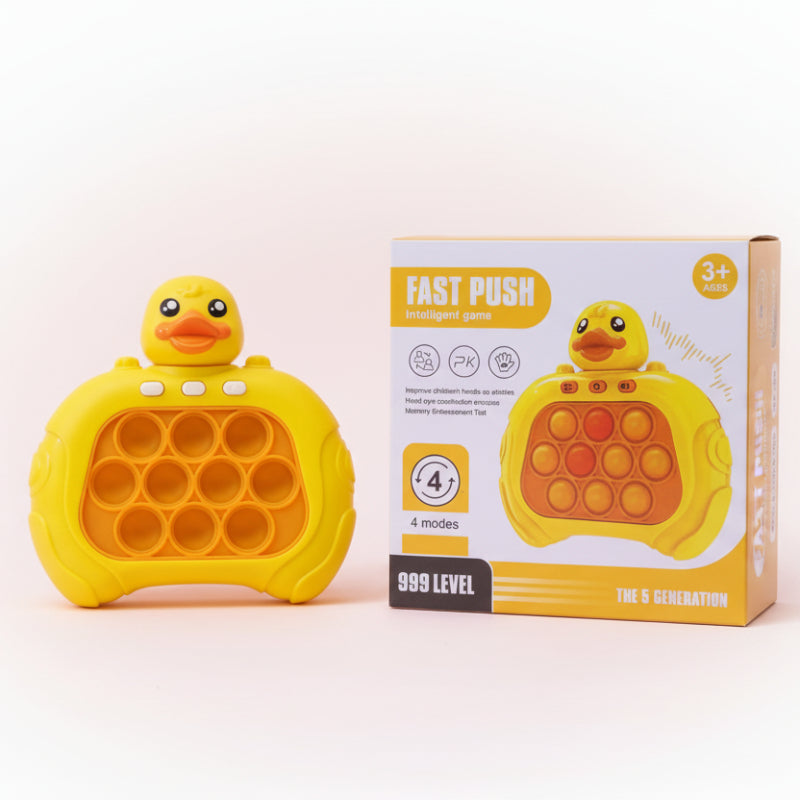 Yellow duck-shaped pop-it toy with packaging on a wooden surface