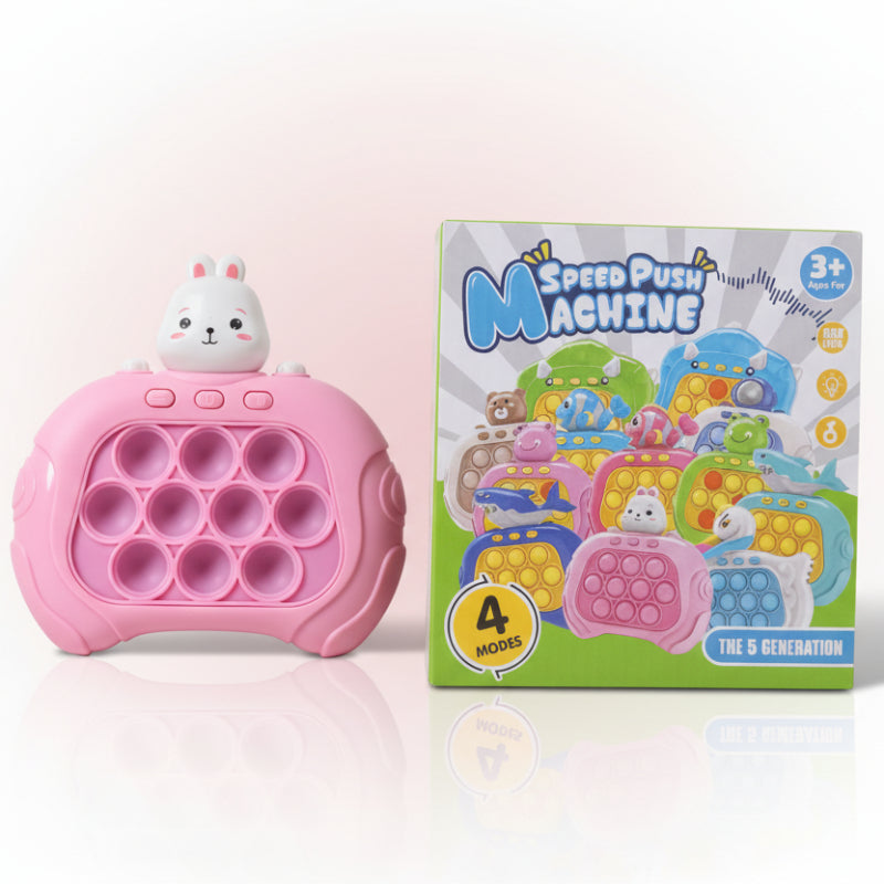 Pink pop-it toy and its packaging on a wooden surface with a white background