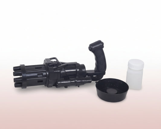 Black handheld device with a white container on a wooden surface