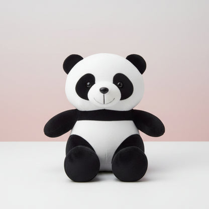 Plush panda toy on a wooden surface with a white background
