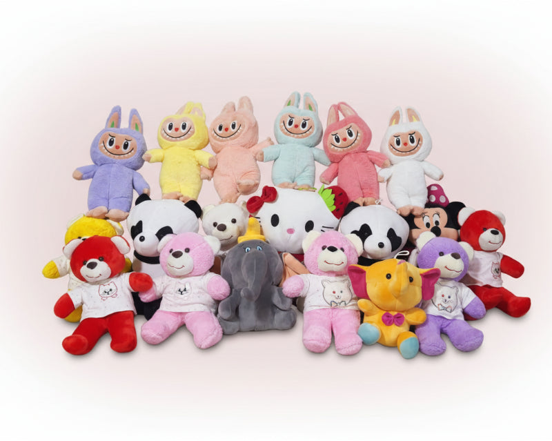 Collection of colorful plush toys on a couch