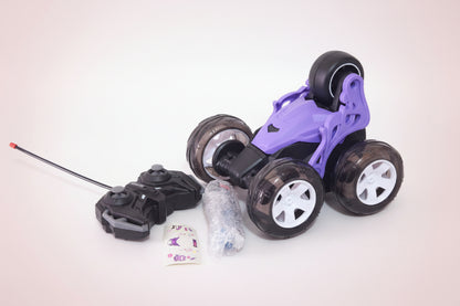 Purple remote control car with wheels on a light background