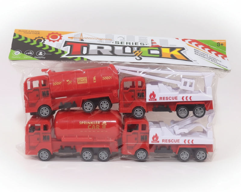 Toy fire truck set in packaging with visible branding on a wooden surface.