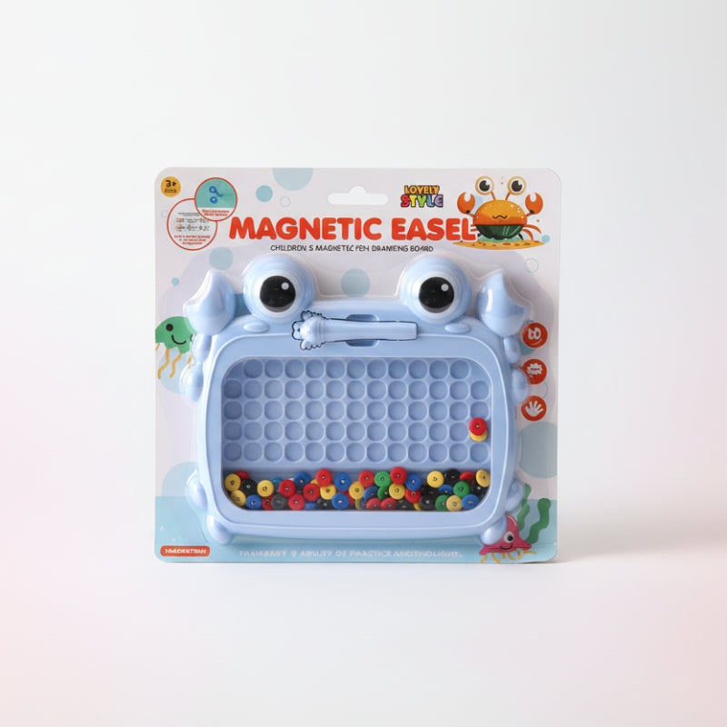 Magnetic easel toy packaging with colorful buttons on a wooden surface