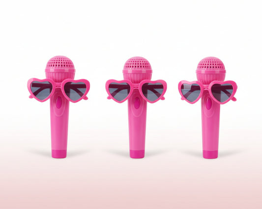 Three toy microphones in packaging featuring different characters on a plain background