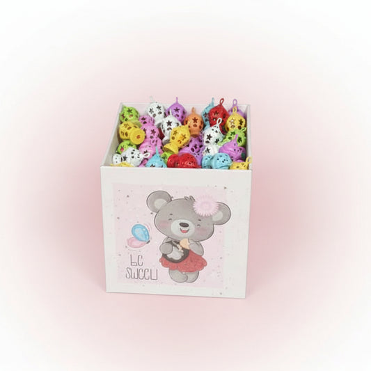 Box of colorful small toys with a bear design on the lid.
