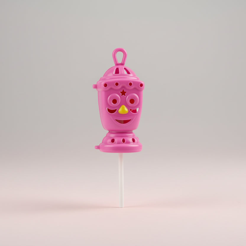 Pink toy on a stick with a face against a brown background