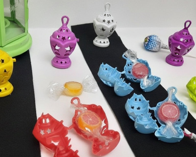 Colorful toy lanterns on a white and black striped surface with 'NOB' branding.