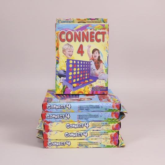 Stack of Connect 4 game boxes with colorful packaging on a wooden surface.