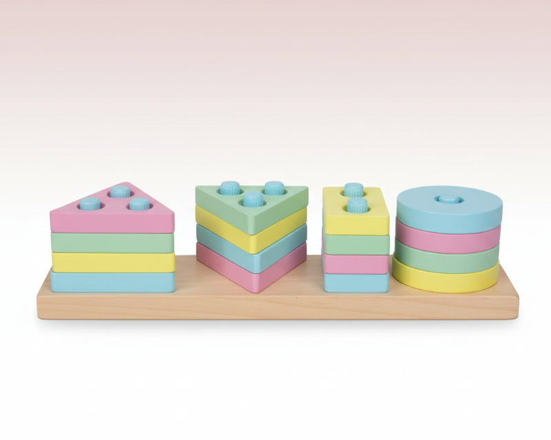 Colorful geometric shape sorting toy on a wooden surface