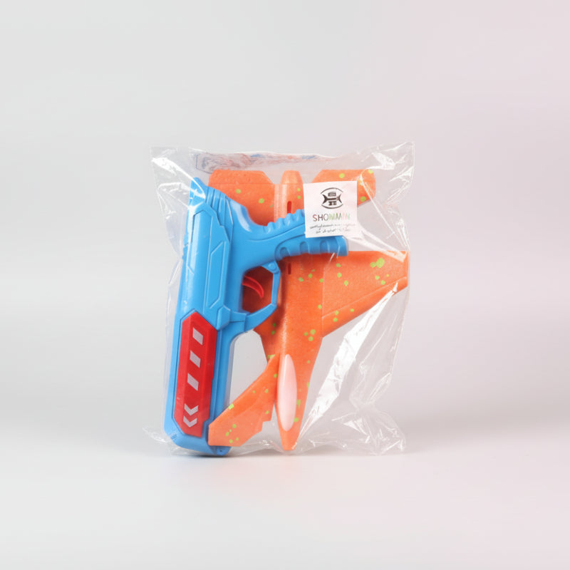 Blue and orange toy gun in clear packaging with a visible brand label.
