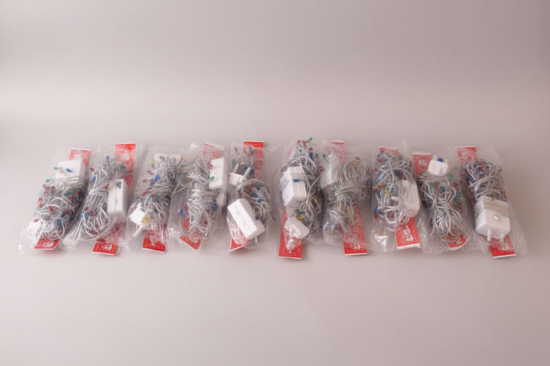 Plastic bags containing electronic components on a wooden surface