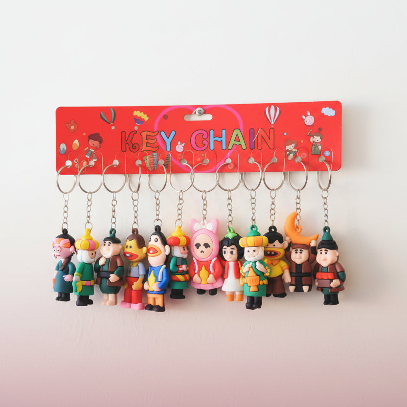 Keychain holder with colorful keychains featuring cartoon characters on a white background