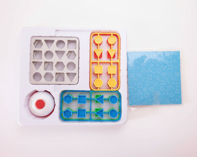 Educational toy with geometric shapes and patterns on a wooden surface