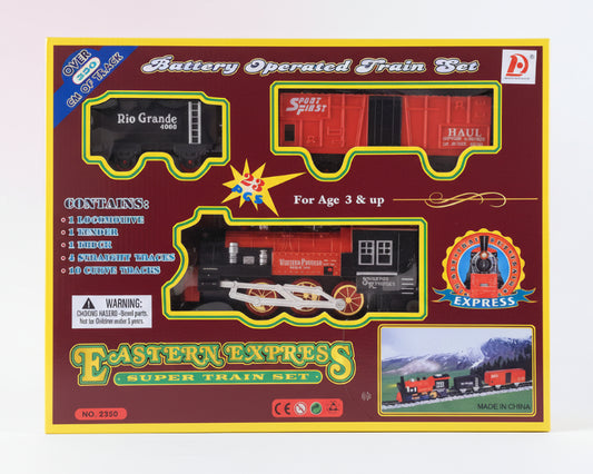 Battery-operated train set packaging with train illustrations and text on a wooden surface.