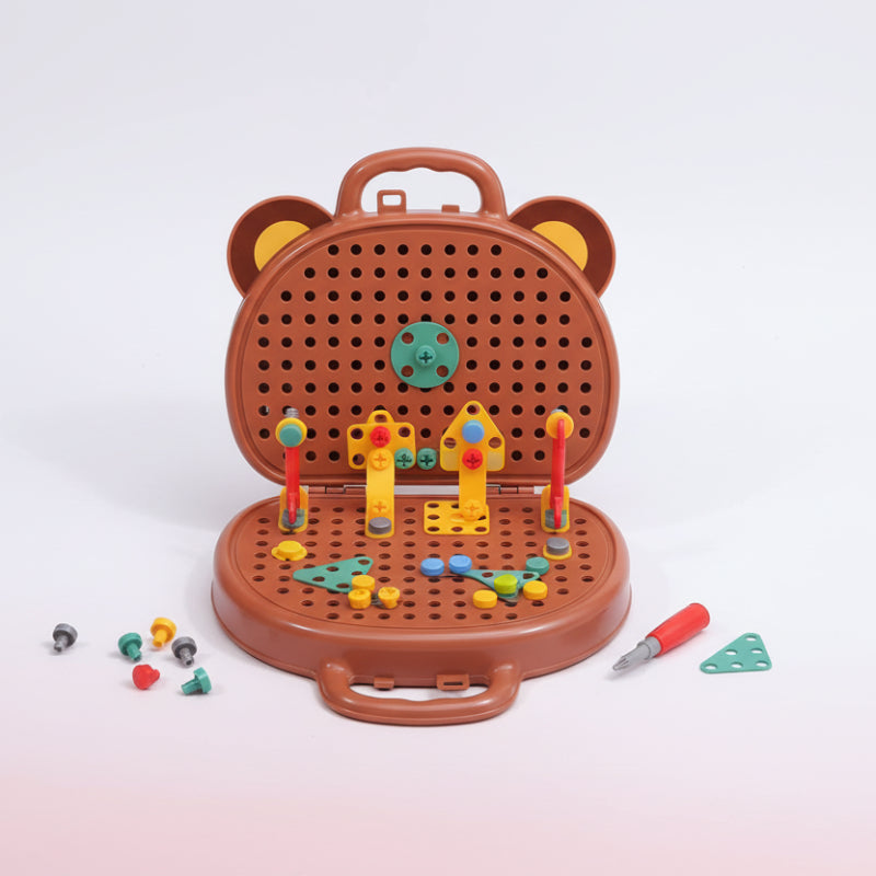Box of a screw puzzle suitcase toy with colorful pieces on a wooden surface.