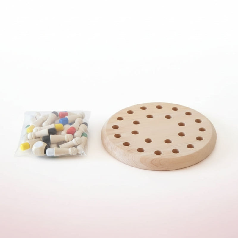 Wooden puzzle with small wooden pieces on a wooden surface