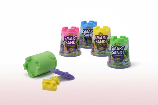 Smart Sand toys with containers and a hand interacting with the sand.