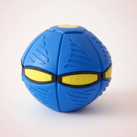 Blue ball with yellow accents on a wooden surface