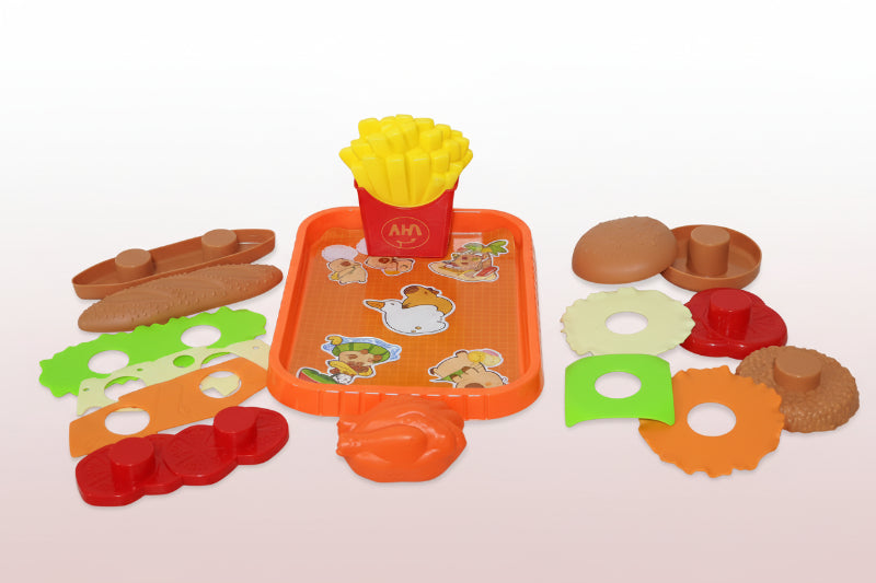 Colorful toy food set on a wooden surface with a white background